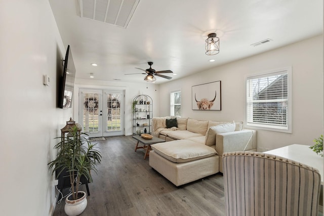753 Theta Pike, Columbia, TN 38401 - living room with wood finished floors, visible vents, and a wealth of natural light
