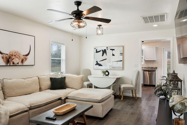 753 Theta Pike, Columbia, TN 38401 - living area with visible vents, dark wood-type flooring, baseboards, recessed lighting, and a ceiling fan