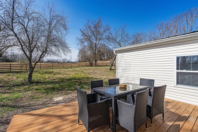 753 Theta Pike, Columbia, TN 38401 - wooden terrace with a rural view, outdoor dining space, and fence