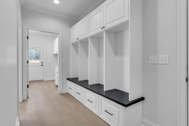 mudroom featuring recessed lighting, baseboards, light wood finished floors, and ornamental molding