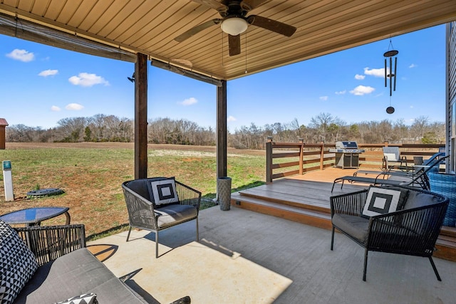 view of patio featuring a ceiling fan and grilling area