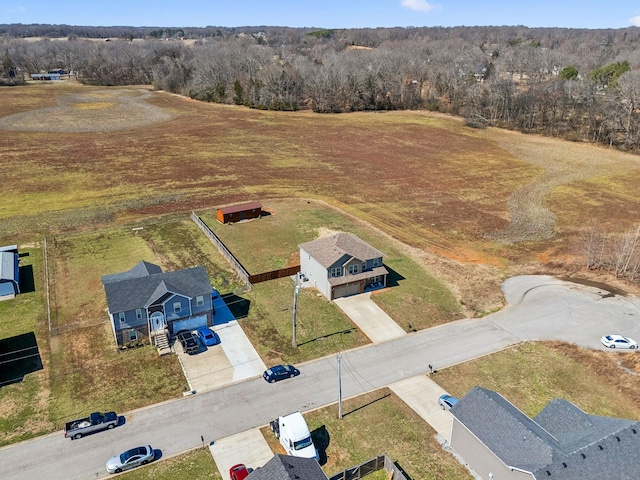 aerial view with a wooded view