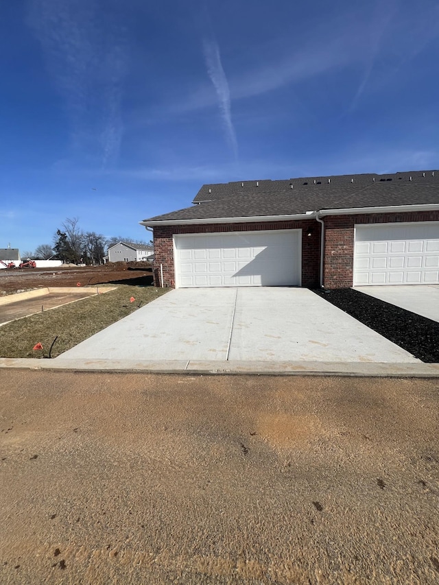 garage with driveway