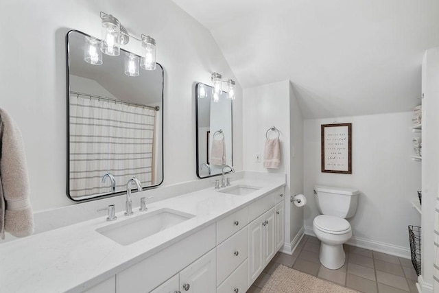 full bath with lofted ceiling, toilet, and a sink