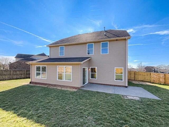 1036 Middleton Ln, Gallatin, TN 37066 - rear view of property featuring a patio area, a fenced backyard, a shingled roof, and a yard