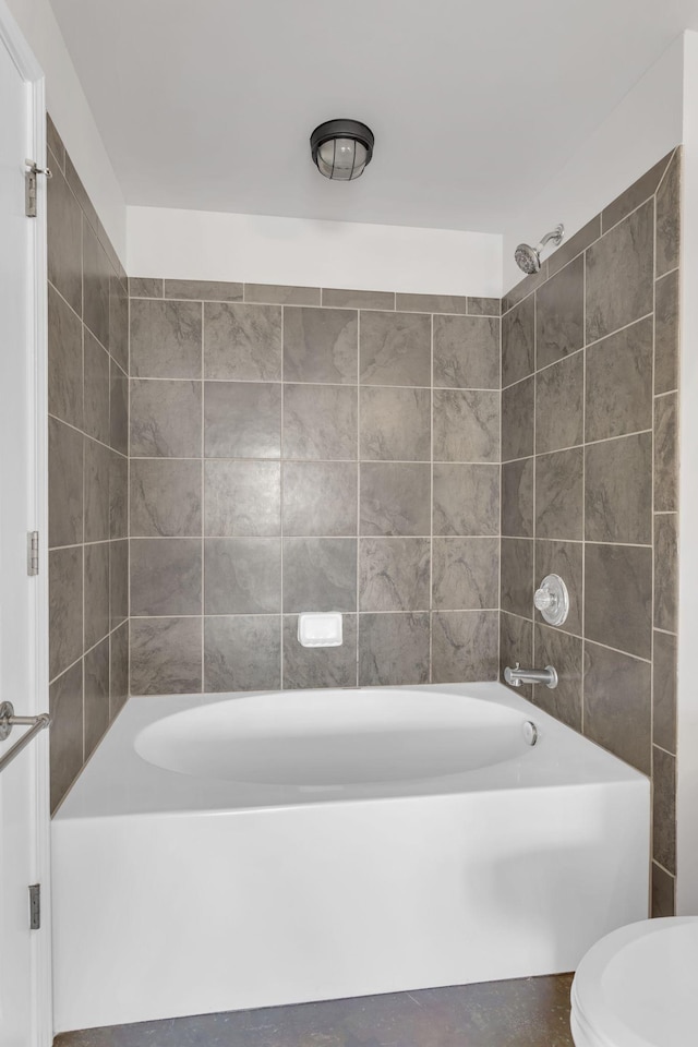 full bathroom with toilet and  shower combination