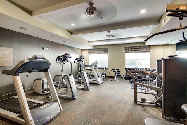 exercise room with recessed lighting, visible vents, and baseboards
