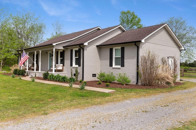 2436 J D Todd Rd, Murfreesboro, TN 37129 - single story home with a porch, brick siding, a front yard, and roof with shingles