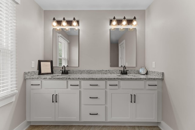 2436 J D Todd Rd, Murfreesboro, TN 37129 - full bathroom with baseboards, a sink, and double vanity