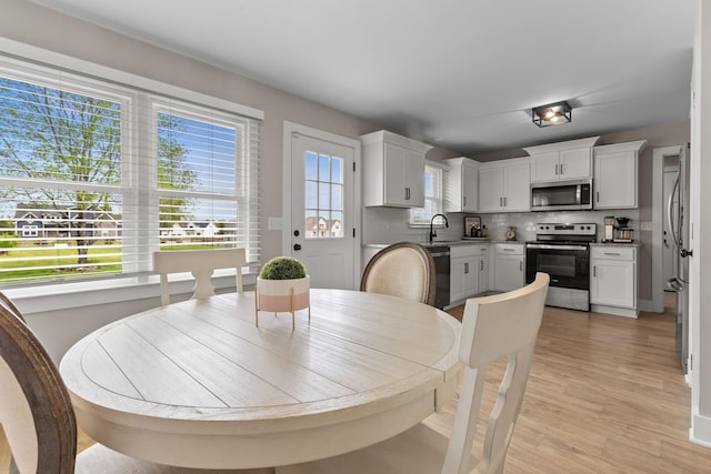2436 J D Todd Rd, Murfreesboro, TN 37129 - dining space with light wood-style floors