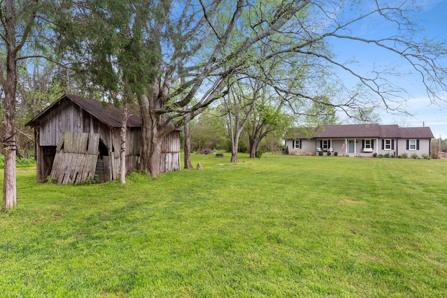 2436 J D Todd Rd, Murfreesboro, TN 37129 - view of yard with an outbuilding