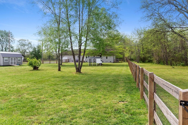 2436 J D Todd Rd, Murfreesboro, TN 37129 - view of yard with fence, an outbuilding, and a shed