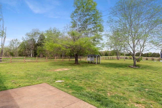 2436 J D Todd Rd, Murfreesboro, TN 37129 - view of yard with exterior structure, fence, and an outbuilding