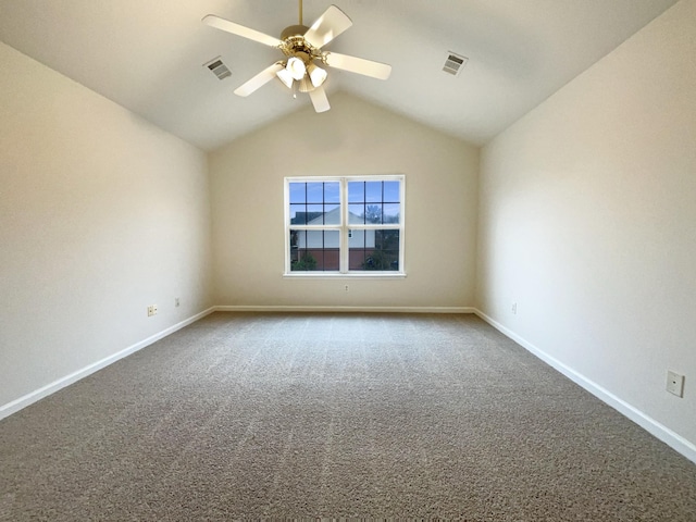 unfurnished room featuring visible vents, baseboards, lofted ceiling, and a ceiling fan