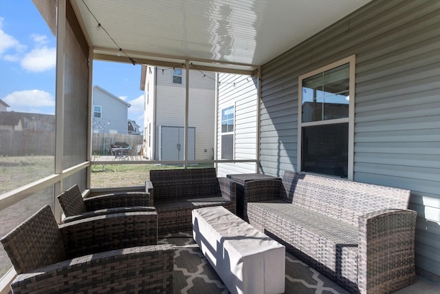 sunroom featuring plenty of natural light