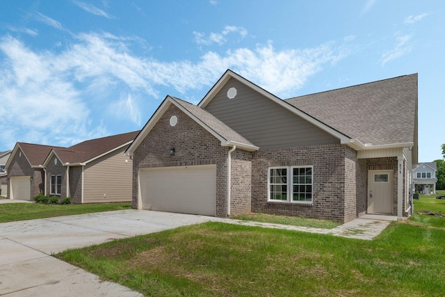 871 Blessings Way, Gallatin, TN 37066 - view of front of property with driveway, a front lawn, roof with shingles, an attached garage, and brick siding