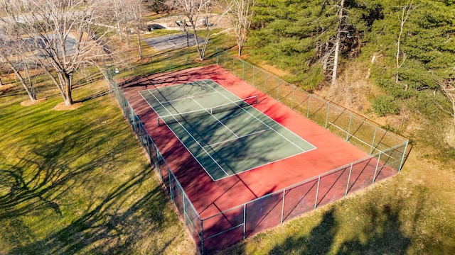 view of sport court with fence