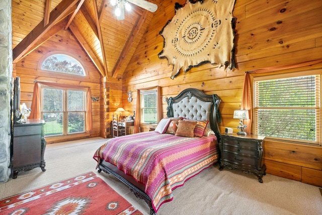 carpeted bedroom featuring wooden walls, multiple windows, wooden ceiling, and beamed ceiling