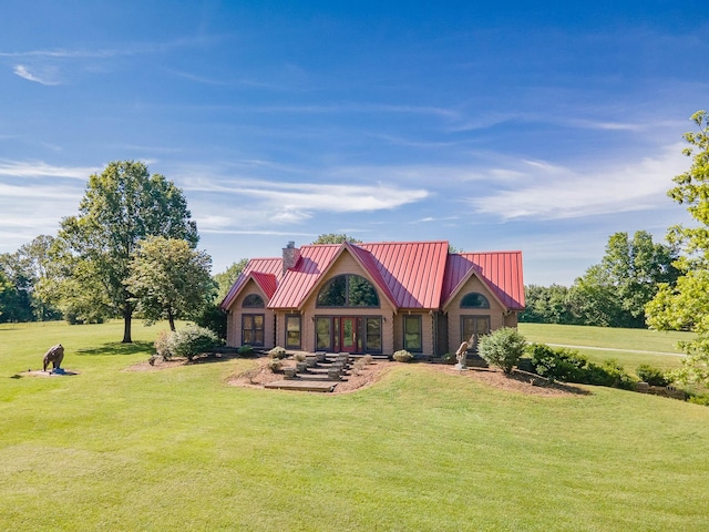 1668 Link Rd, New Johnsonville, TN 37134 - rear view of property with a lawn, metal roof, and a chimney