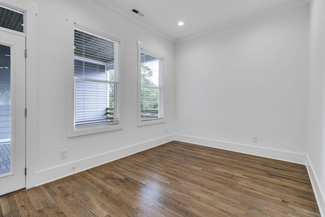 unfurnished room with visible vents, baseboards, ornamental molding, recessed lighting, and dark wood-style flooring