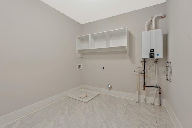 904 32nd Ave N Unit A, Nashville, TN 37209 - laundry area with water heater, electric dryer hookup, hookup for a washing machine, and light marble finish flooring