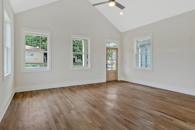 904 32nd Ave N Unit A, Nashville, TN 37209 - unfurnished room featuring plenty of natural light, high vaulted ceiling, wood finished floors, and a ceiling fan