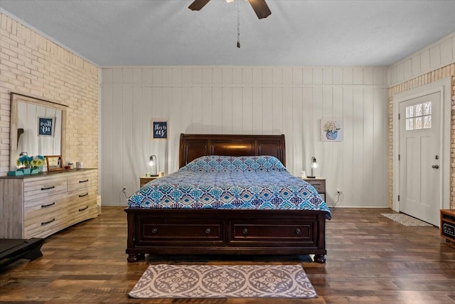 bedroom featuring dark wood-style flooring and ceiling fan