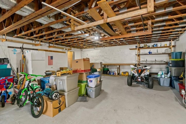 garage with freestanding refrigerator