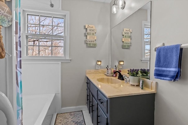 full bathroom with tile patterned flooring, baseboards, vanity, and shower / bath combination with curtain