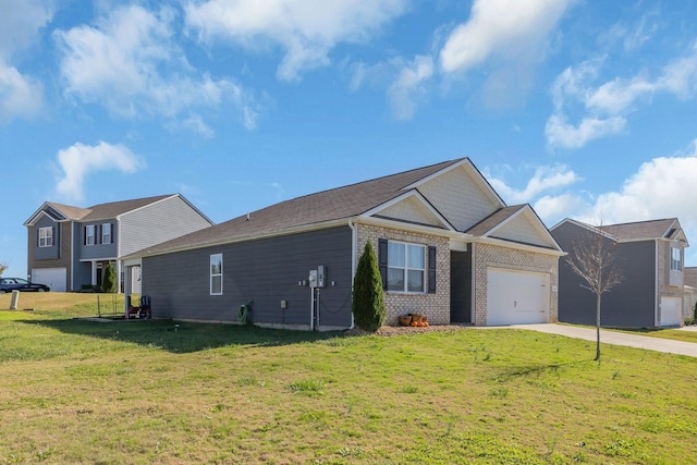 view of front facade with brick siding, driveway, a front yard, and an attached garage