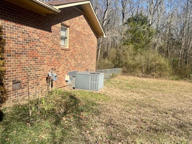 view of yard featuring central AC unit