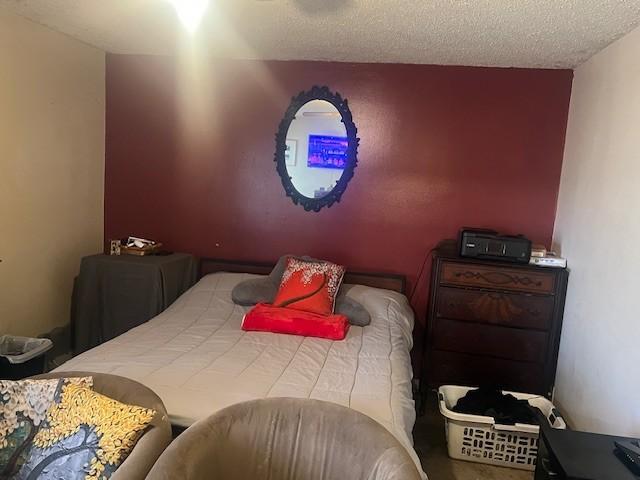 bedroom with a textured ceiling