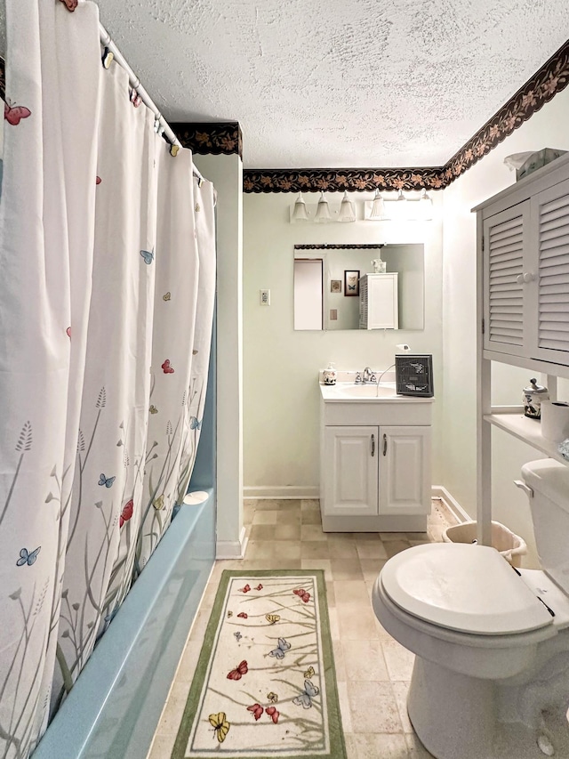 bathroom featuring vanity, shower / tub combo, toilet, and a textured ceiling