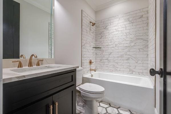 bathroom featuring shower / bathing tub combination, toilet, and vanity