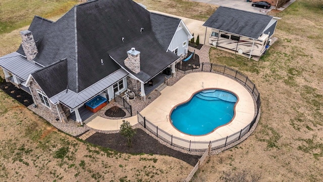 view of swimming pool featuring a fenced backyard, a fenced in pool, and a patio