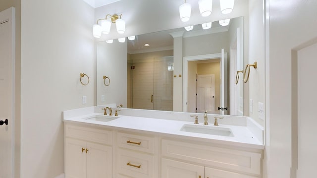 bathroom featuring double vanity, a shower stall, and a sink