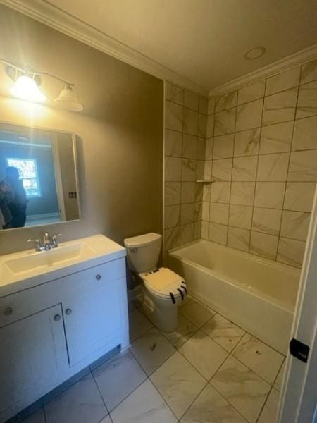 bathroom with vanity, crown molding, and toilet