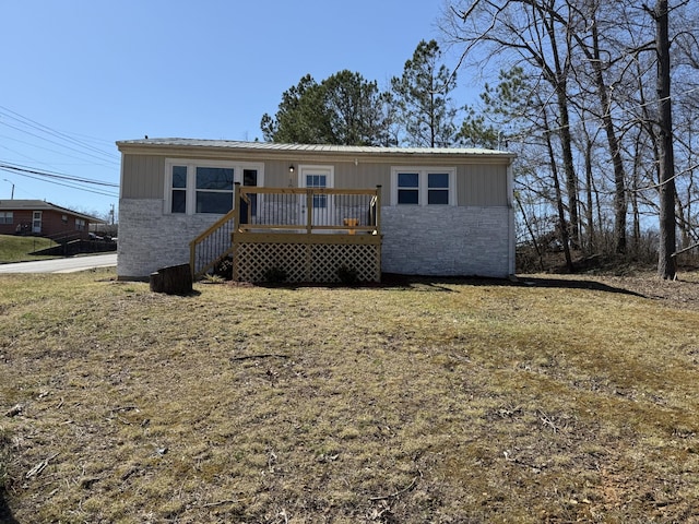 view of front of home with a deck