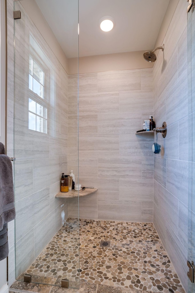 bathroom featuring a stall shower