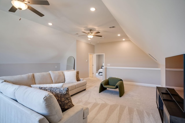 living room with recessed lighting, baseboards, light colored carpet, and vaulted ceiling