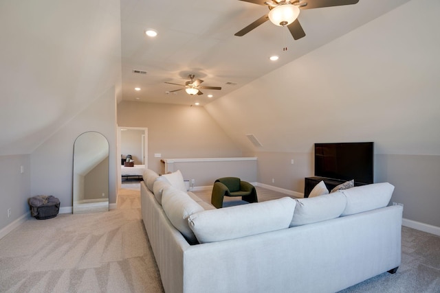 living room with recessed lighting, baseboards, light carpet, and lofted ceiling