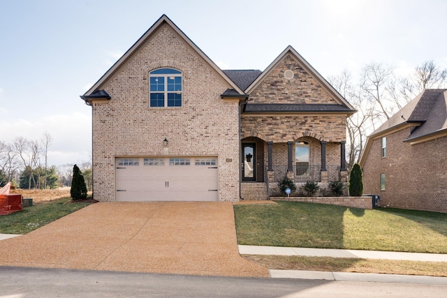 view of front of property featuring a front lawn, covered porch, concrete driveway, a garage, and brick siding