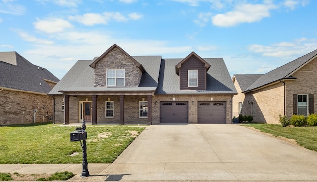 view of front facade with brick siding, a porch, concrete driveway, a front yard, and roof with shingles