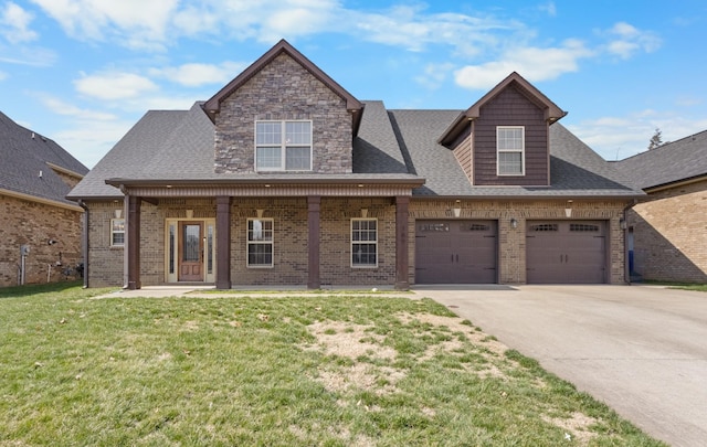 view of front facade featuring an attached garage, a shingled roof, concrete driveway, a front lawn, and brick siding