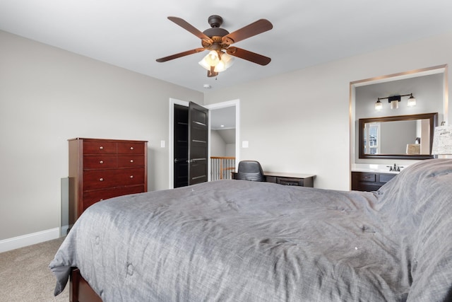 bedroom featuring carpet flooring, a ceiling fan, and baseboards