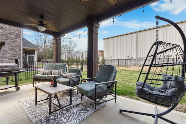 view of patio / terrace featuring grilling area, outdoor lounge area, a fenced backyard, and a ceiling fan