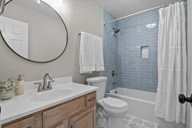 full bath featuring toilet, shower / bath combo with shower curtain, and vanity