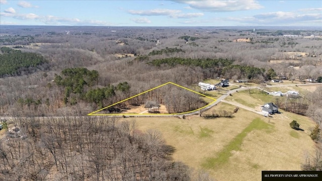 birds eye view of property with a rural view