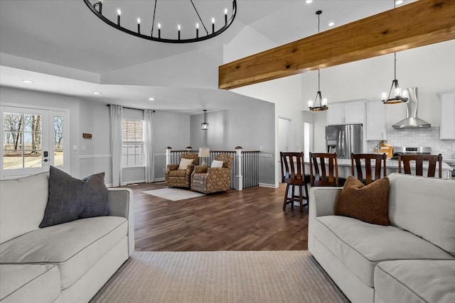 living room with recessed lighting, high vaulted ceiling, and dark wood-style floors