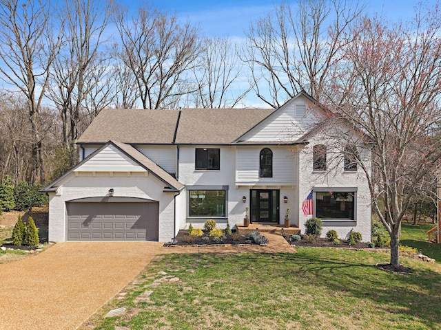 view of front of house with brick siding, a shingled roof, a front lawn, concrete driveway, and a garage